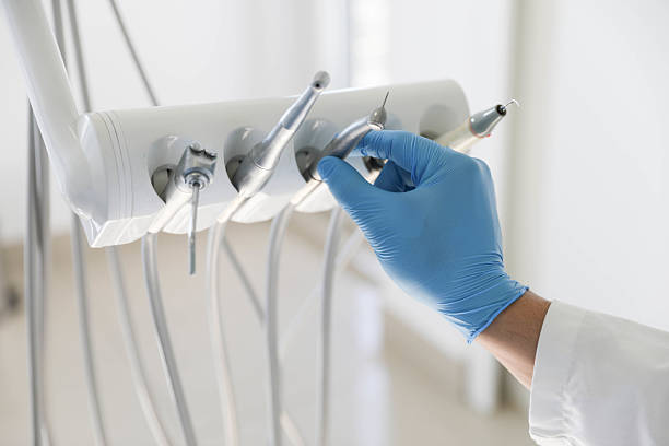 Professional Tooth Extraction technician working in Newberry, MI